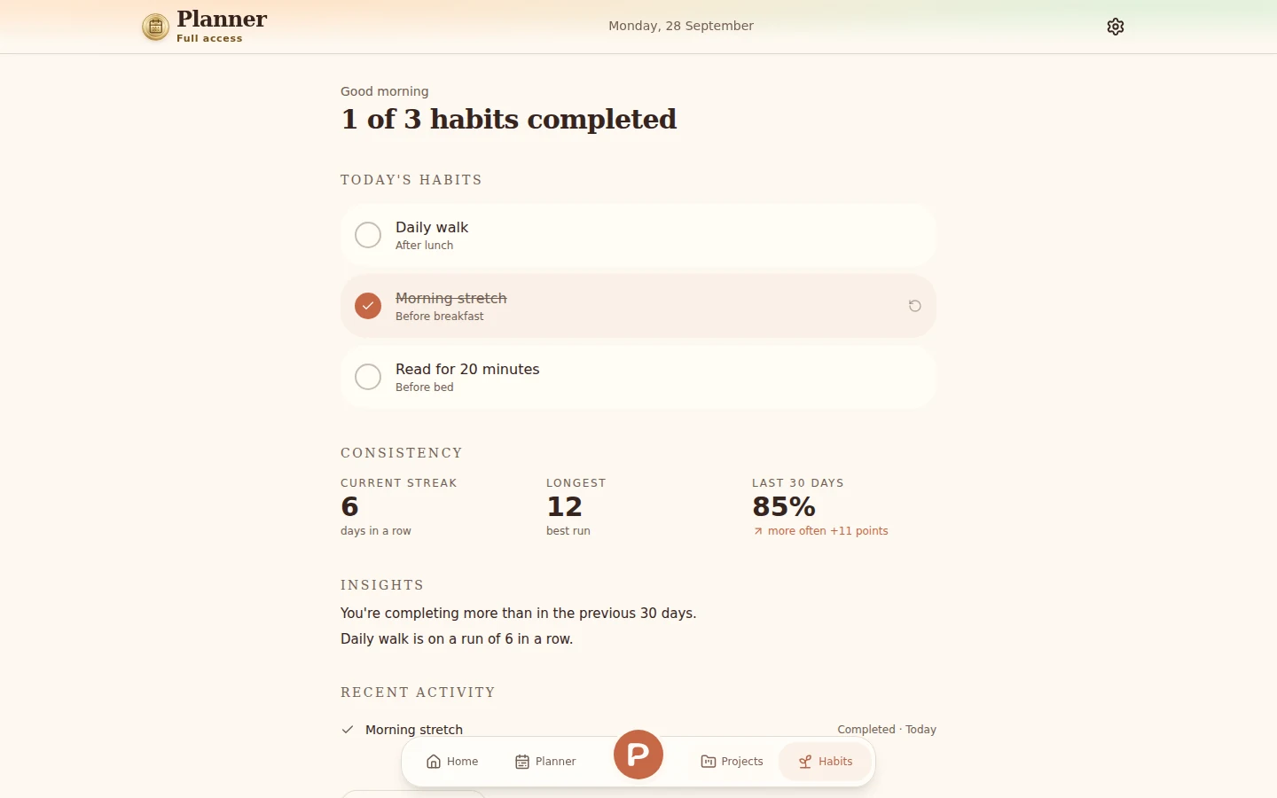 Habit Builder on a laptop, with personal routines and consistency tracking